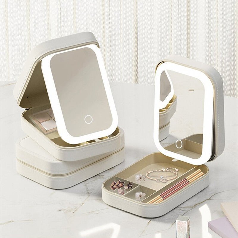 Two portable makeup mirrors with LED lights on a white surface.
